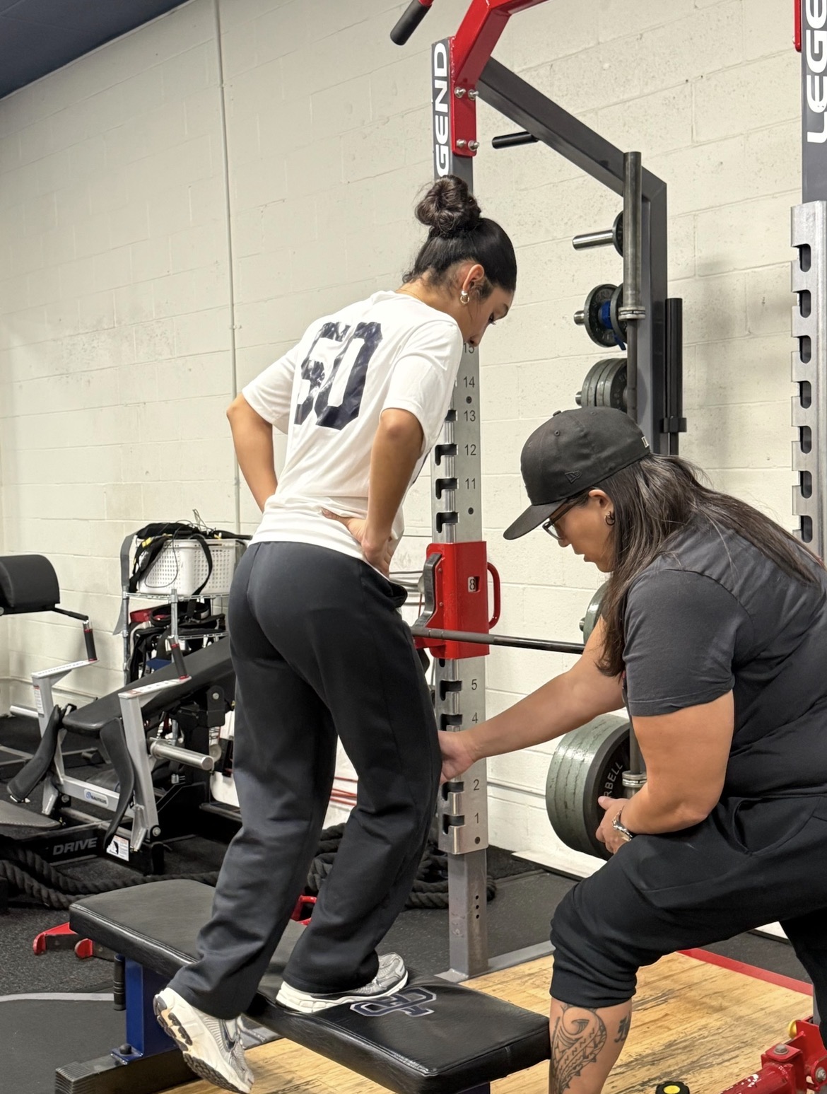 Step-up coaching cue under the squat rack
